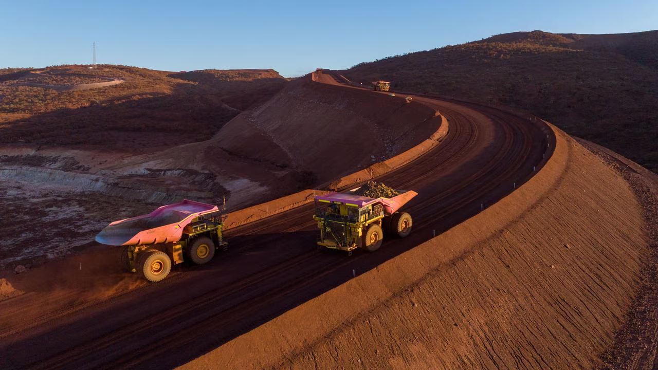Haul trucks working a Pilbara iron ore operation